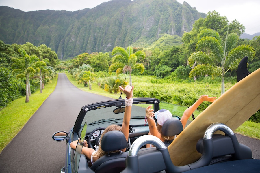 People driving in hawaii with convertible top down
